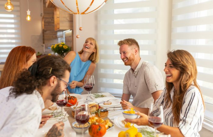 Friends having dinner party
